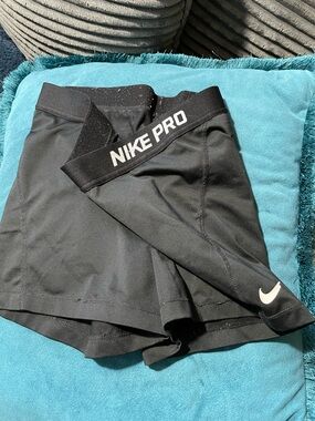 Nike Black Athletic Compression Shorts with White Swoosh